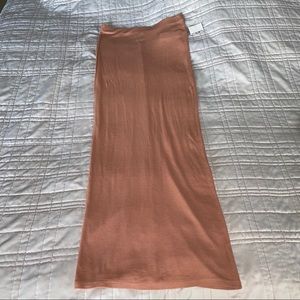 TWO rib knit skirts. One pink one olive green.